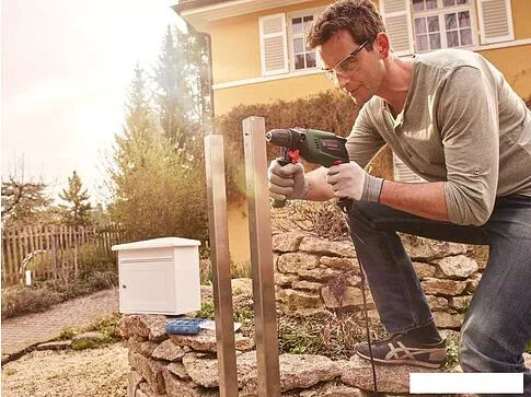 Ударная дрель Bosch UniversalImpact 700 [0603131020]