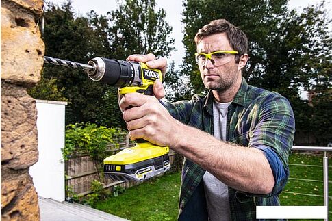 Ударная дрель-шуруповерт Ryobi HP RPD18C-242S 5133004983 (с 2-мя АКБ 4 Ah + 2 Ah, сумка)