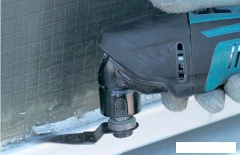 Мультифункциональная шлифмашина Makita DTM50RFE