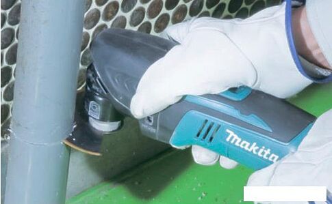 Мультифункциональная шлифмашина Makita DTM50RFE
