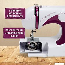 Электромеханическая швейная машина Janete 565 (Purple 683C) Электромеханическая швейная машина Janete 565 (Purple 683C)