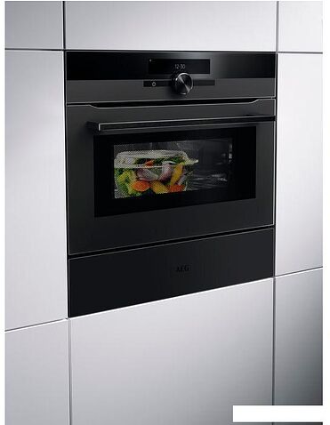 Электрический духовой шкаф AEG KMK965090T