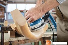 Эксцентриковая шлифмашина Bosch GET 55-125 Professional 0601257000 Эксцентриковая шлифмашина Bosch GET 55-125 Professional 0601257000