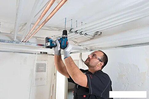 Ударная дрель-шуруповерт Bosch GSB 18V-65 Professional 06019N3100 (с 2-мя АКБ, кейс)